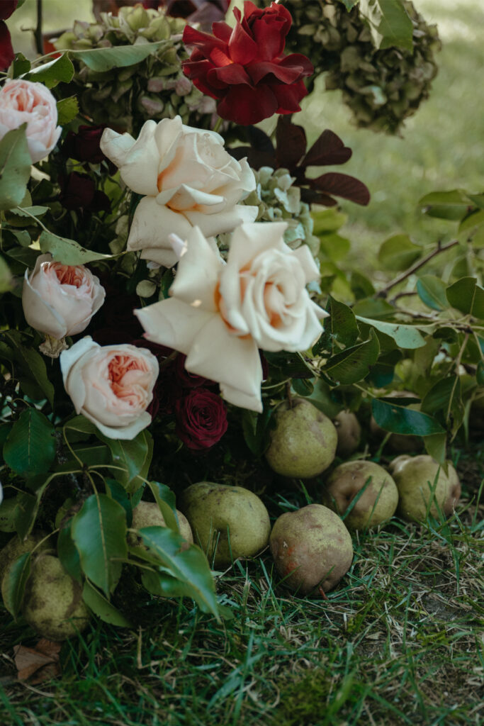 fruit in a wedding ceremony arch