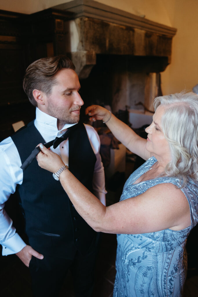 groom getting ready at castello di ristonchi wedding