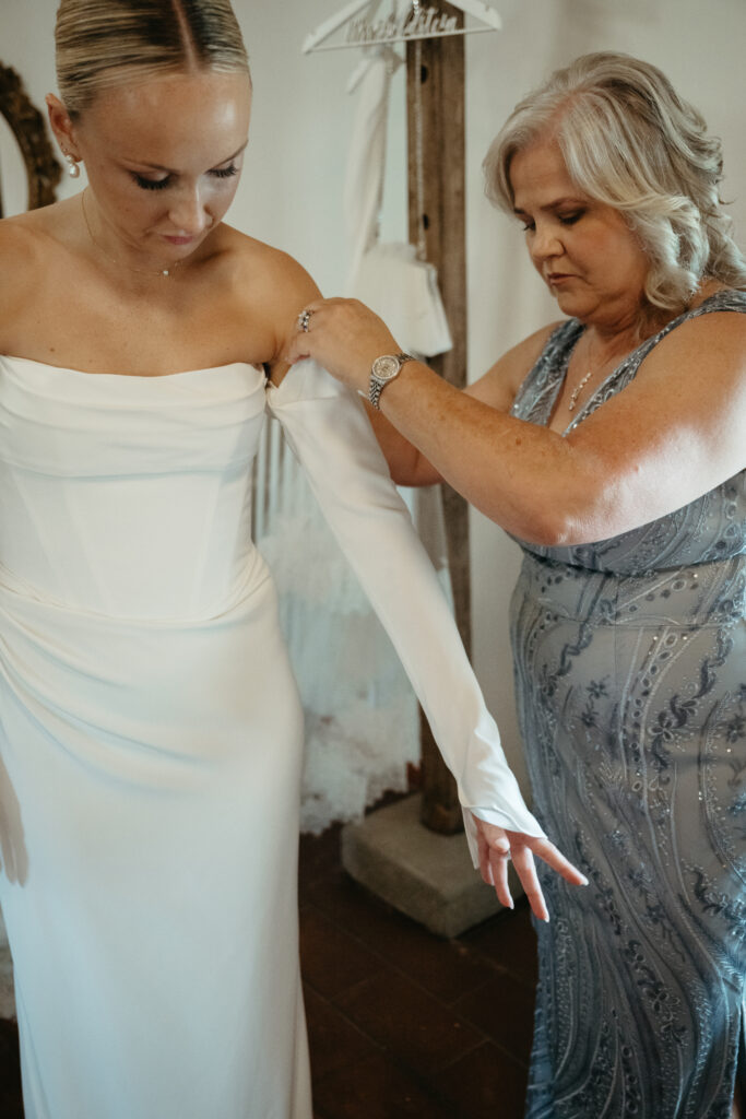 bride getting ready at castello di ristonchi wedding 