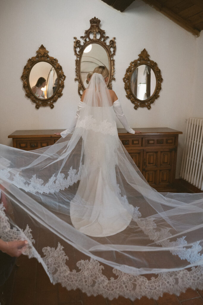 bride getting ready at castello di ristonchi wedding 