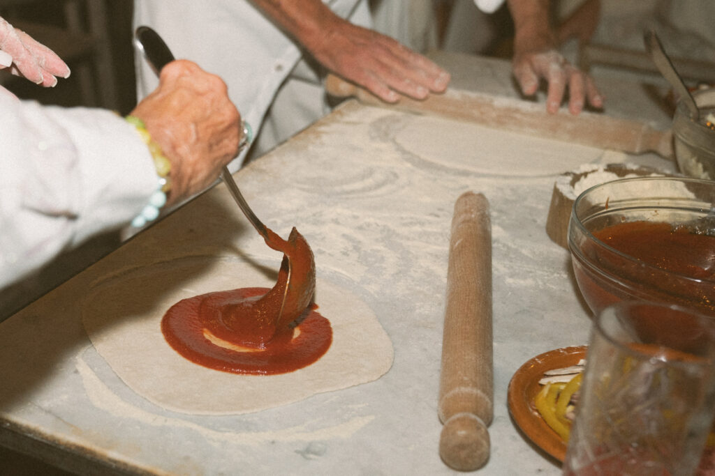 make your own pizza at castello di ristonchi wedding welcome dinner