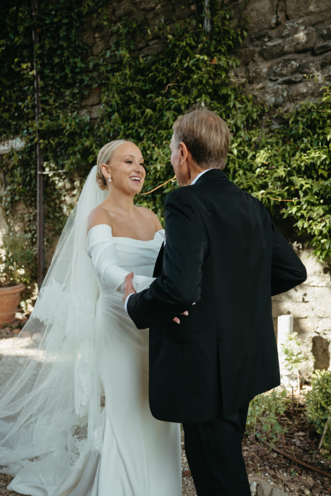 father and daughter first look photos at Castello di Ristonchi wedding