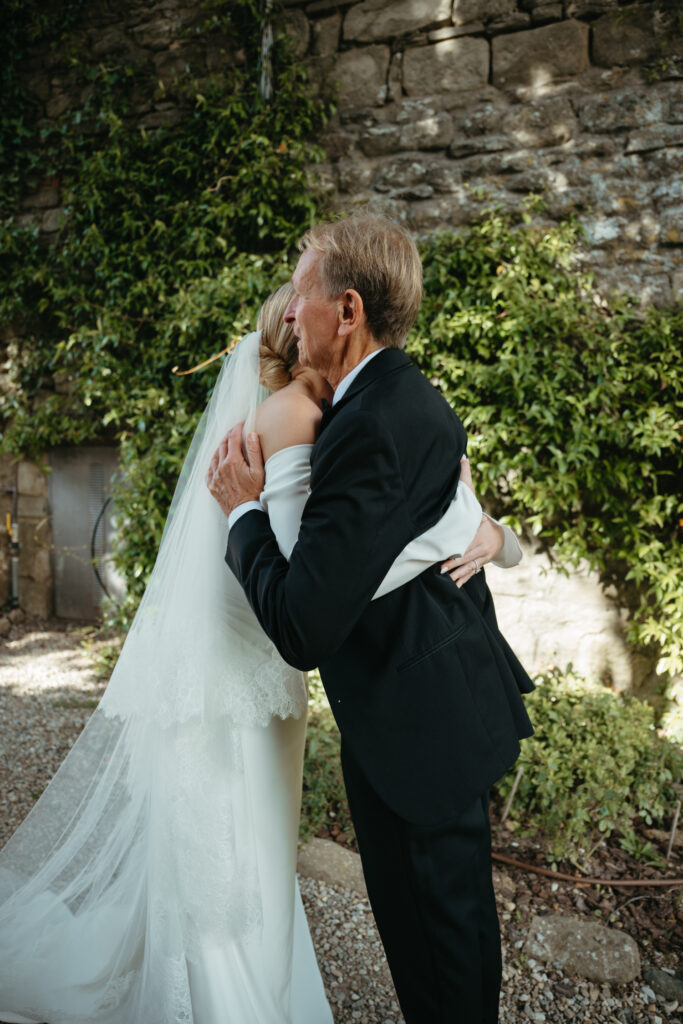 father and daughter first look photos at Castello di Ristonchi wedding