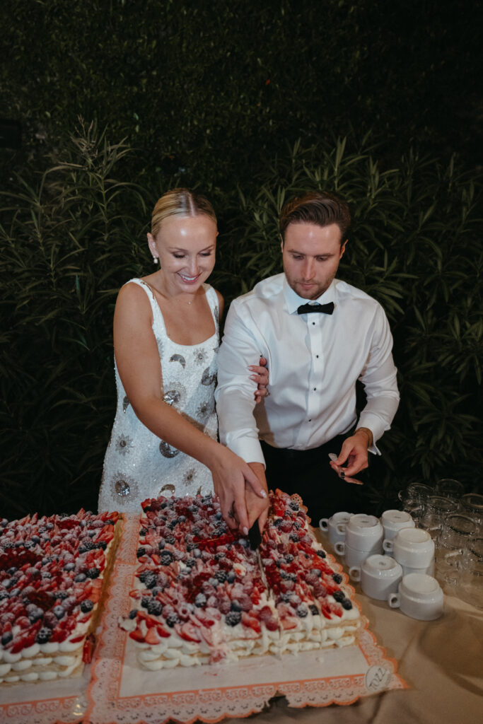 tuscany wedding reception cake cutting