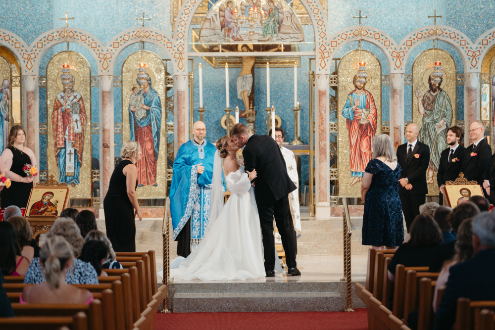 first kiss at st nicholas wedding ceremony