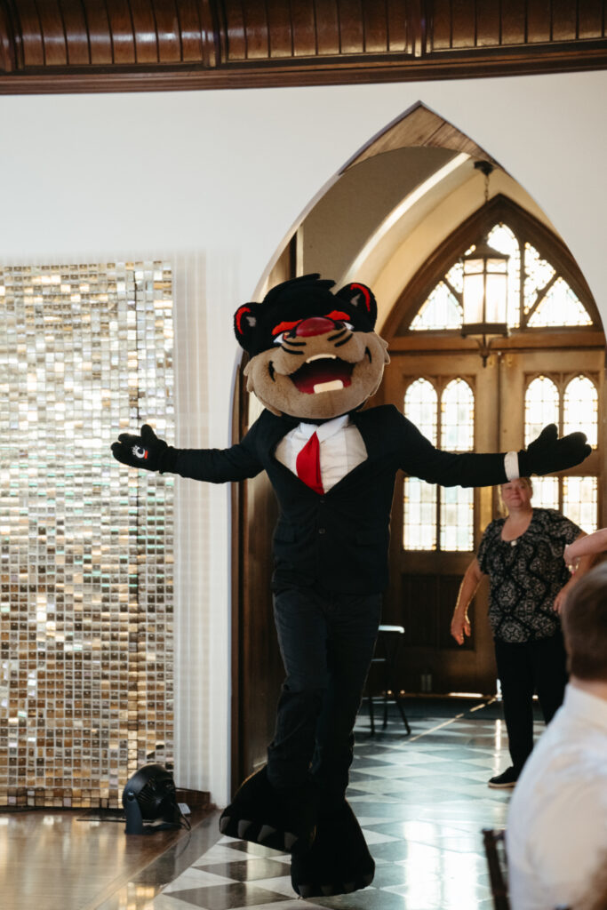 UC Bearcat mascot entering wedding reception at the palomar cincinnati