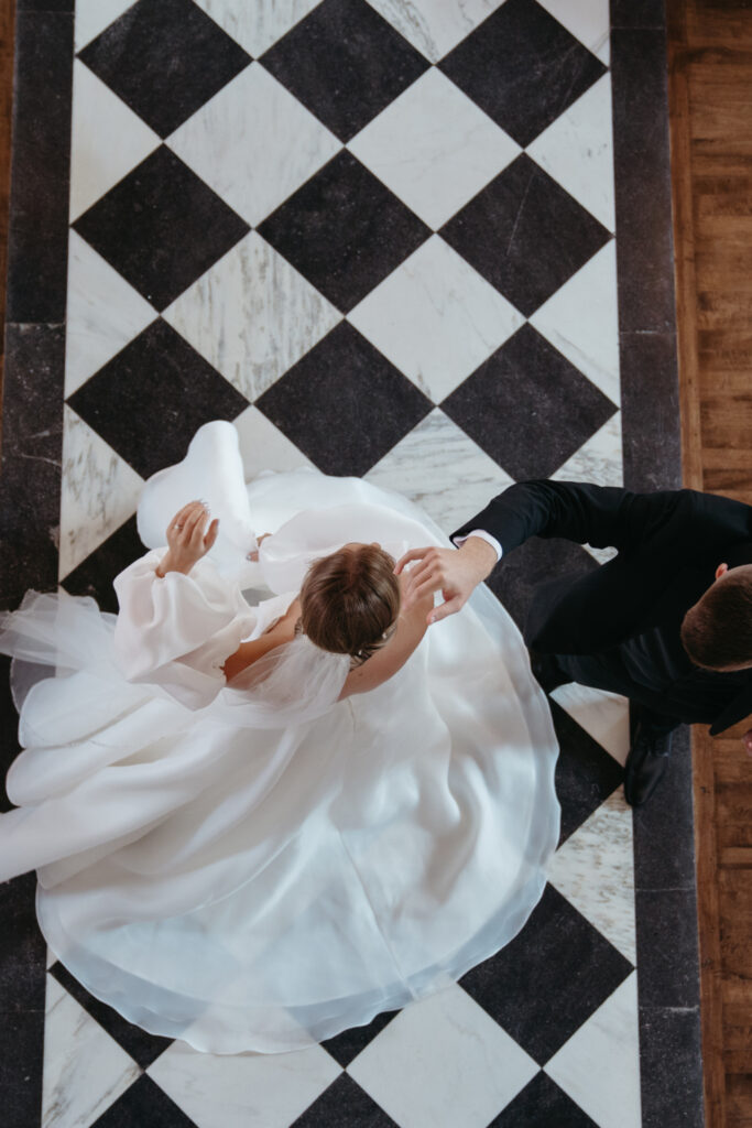 bride and groom embracing at the palomar cincinnati