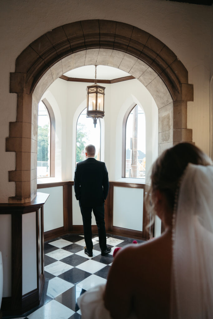 bride and groom first look at st nicholas cincinnati