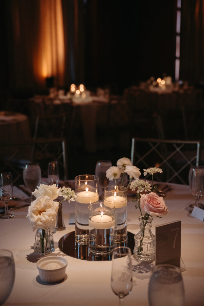 reception table at cincinnati club with white roses and baby's breath