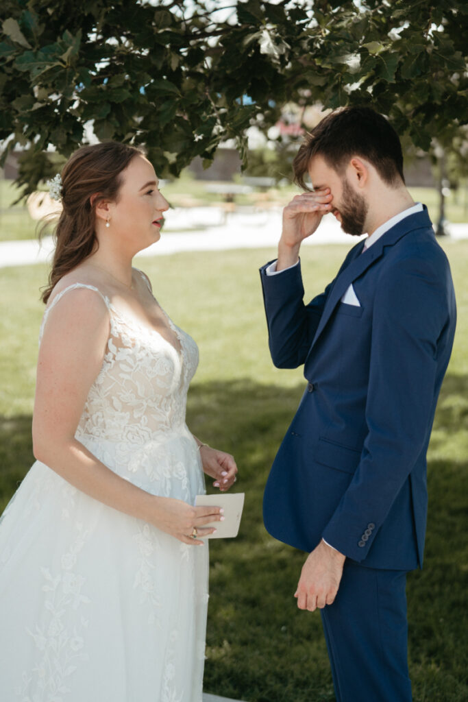 groom crying at private vow renewal