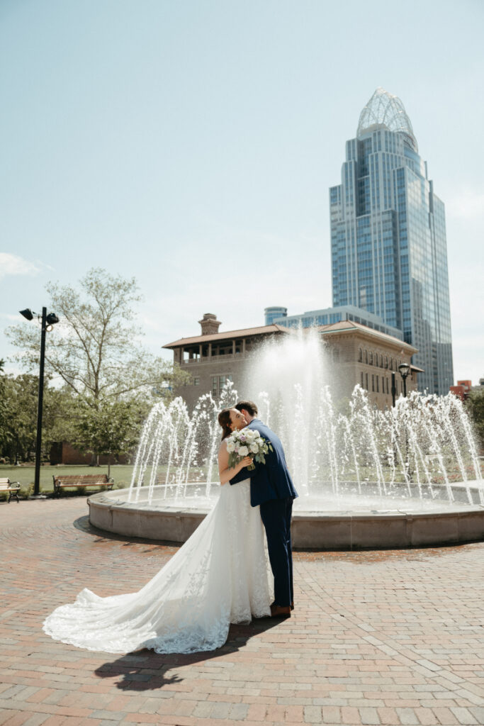 wedding photo ideas in front of a water fountain