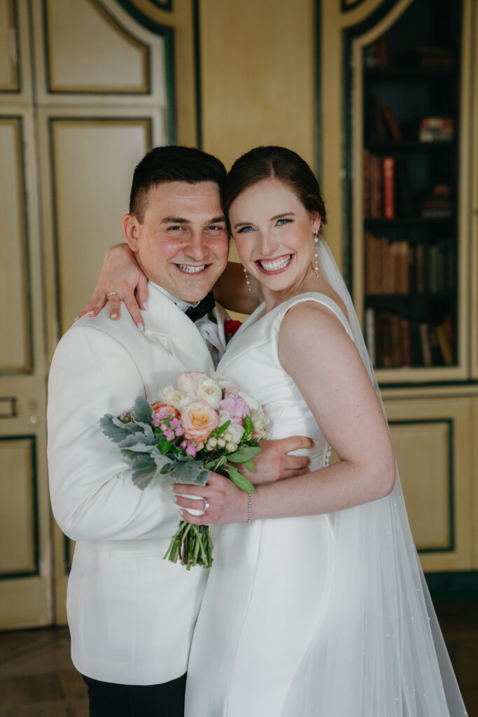 real-wedding-feature bride and groom holding each other close during their editorial photos around the property of Peterloon Estate