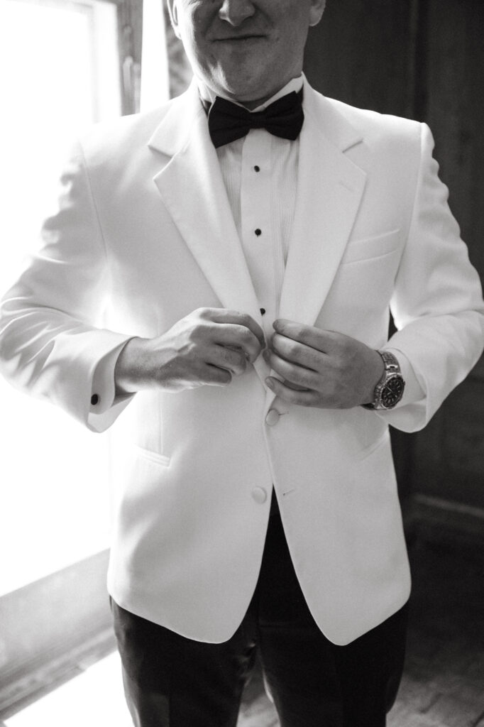 real-wedding-feature groom in his 007 inspired suit
