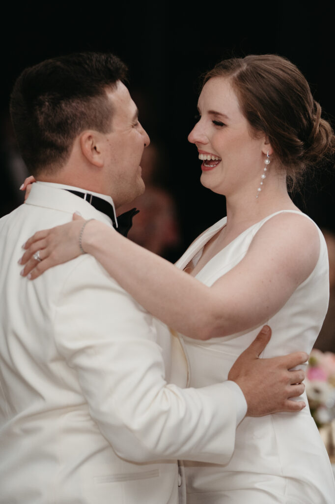 real-wedding-feature husband and wide sharing a moment on the dance floor at their wedding reception