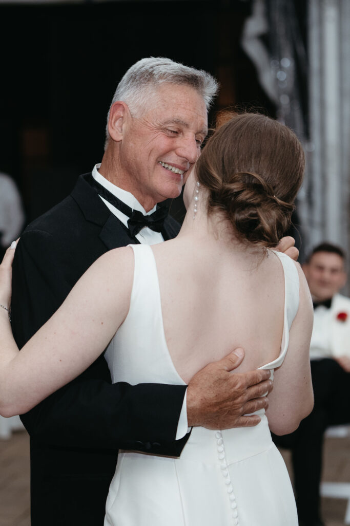 real-wedding-feature father of the bride and his daughter sharing a moment on the dance floor at this real wedding feature