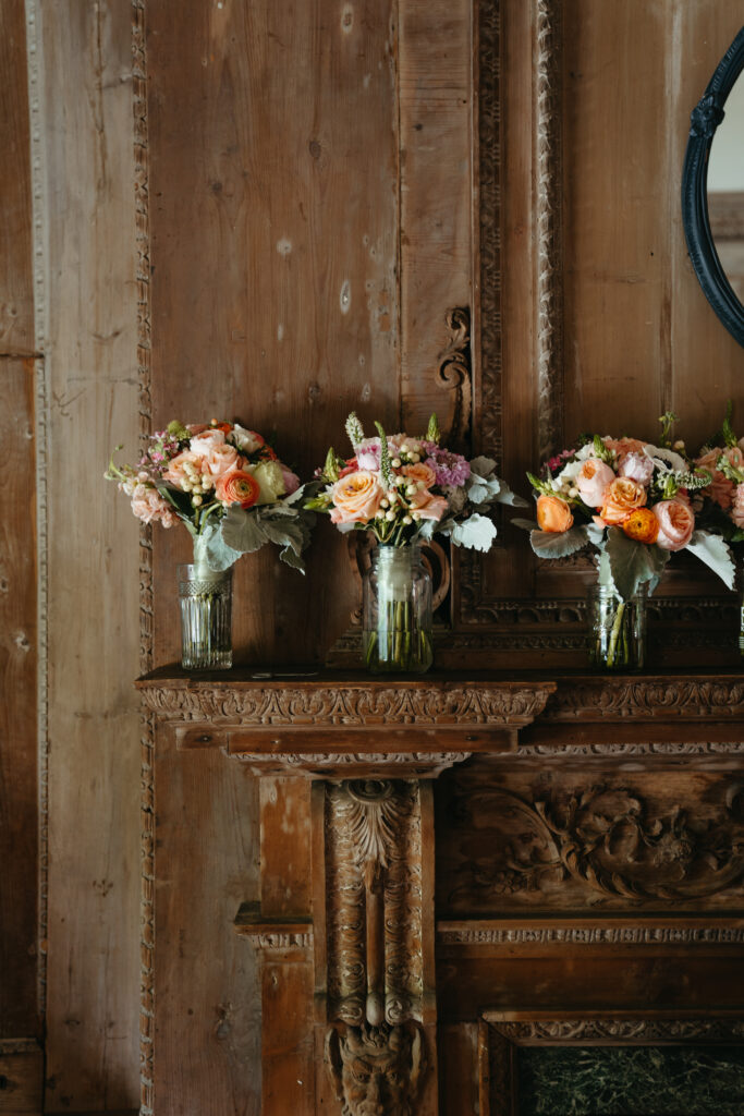 real-wedding-feature flowers on a stunning wood mantel - real wedding feature at Peterloon Estate