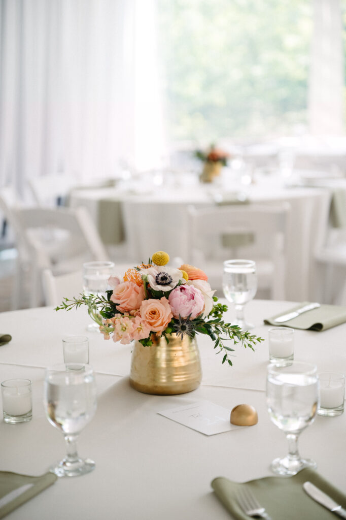 wedding-color-palette Soft and elegant wedding color palette with pastel florals in a gold vase on white.