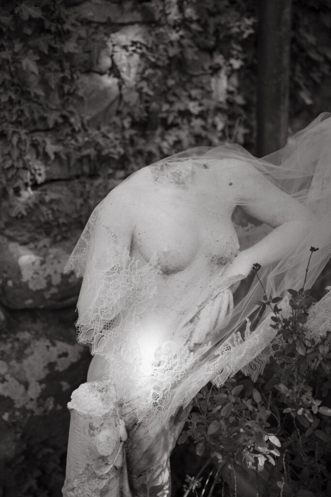 italy wedding with veil on italian statue
