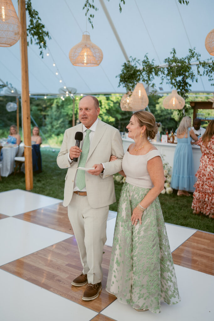 mother and father of the bride sharing a speech at a wedding at Meshawa House
