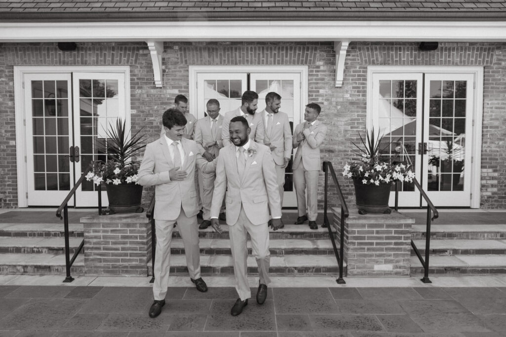 black and white photo of the groom and his groomsmen - Wedding at Meshewa House