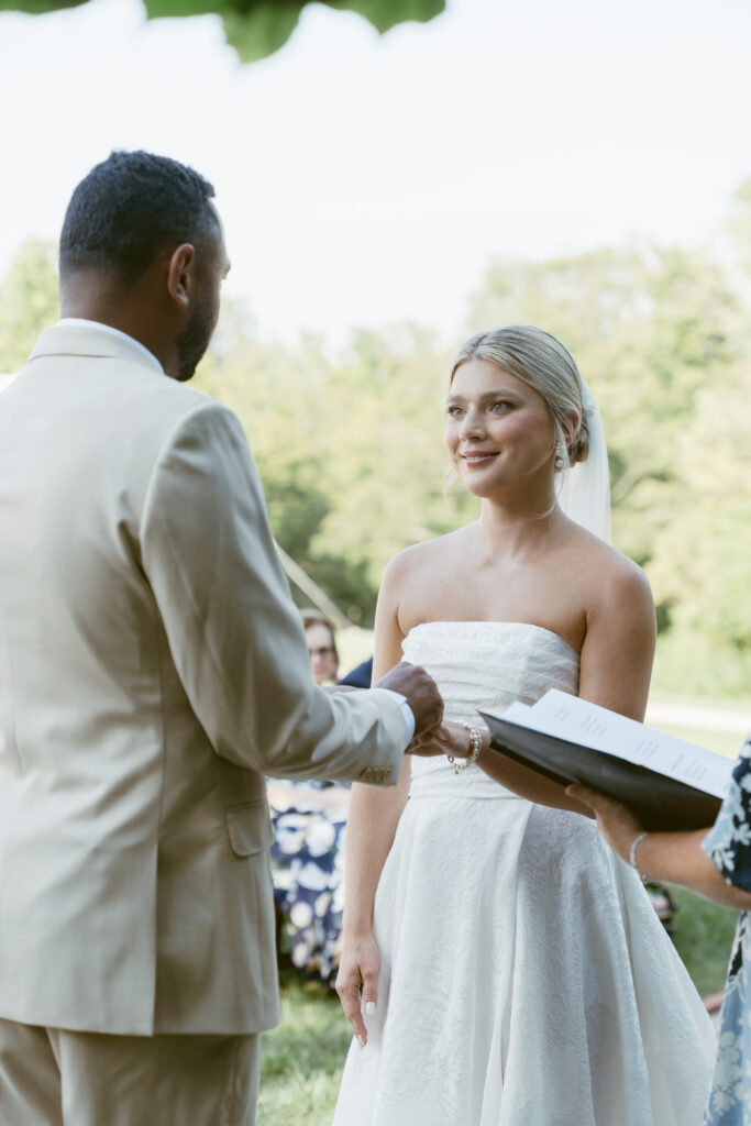 bride and groom saying their vows at their Wedding at Meshewa House