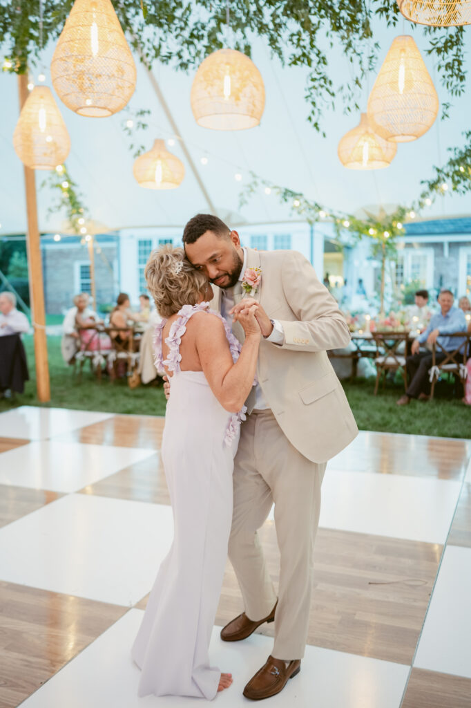 Groom having his dance with his mom during his wedding at Meshawa House
