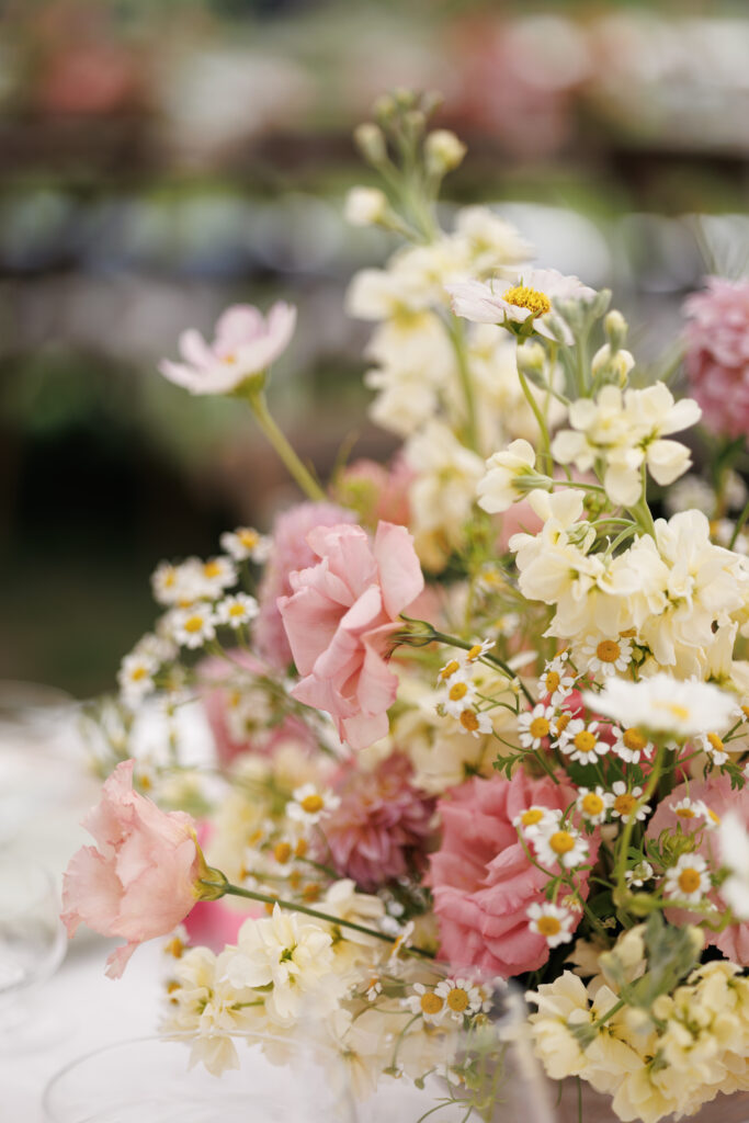 lush pink and cream florals at a garden wedding