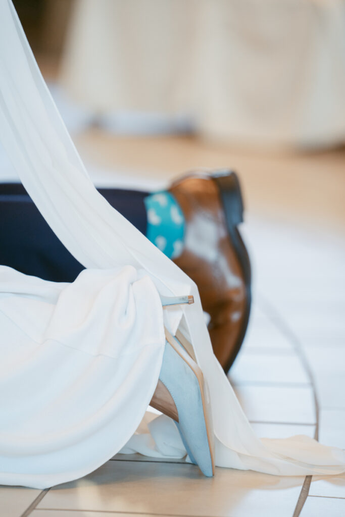 Close-up of couple kneeling during Catholic ceremony before their Laurel Court wedding celebration.