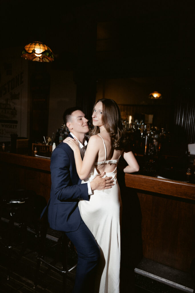 Engaged couple shares a joyful, intimate moment after they just got engaged.