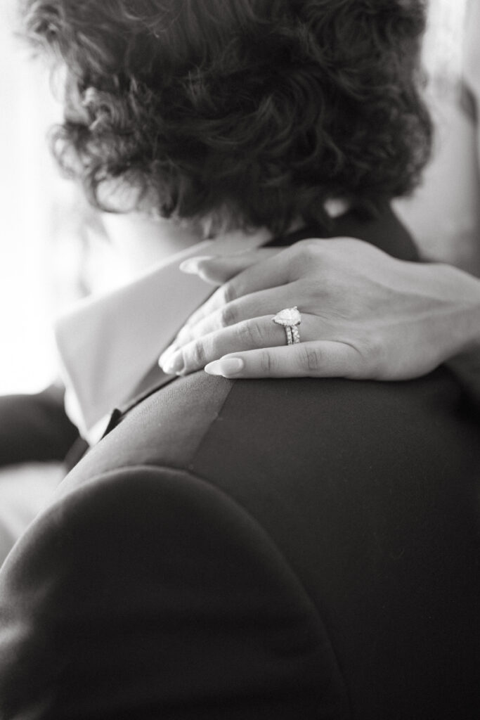Close up of bride’s engagement ring during intimate Valentine’s Day wedding.
