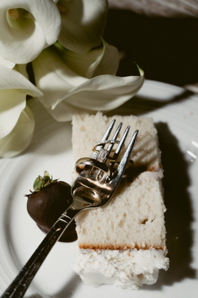 Dessert plate with cake and fork during the reception.