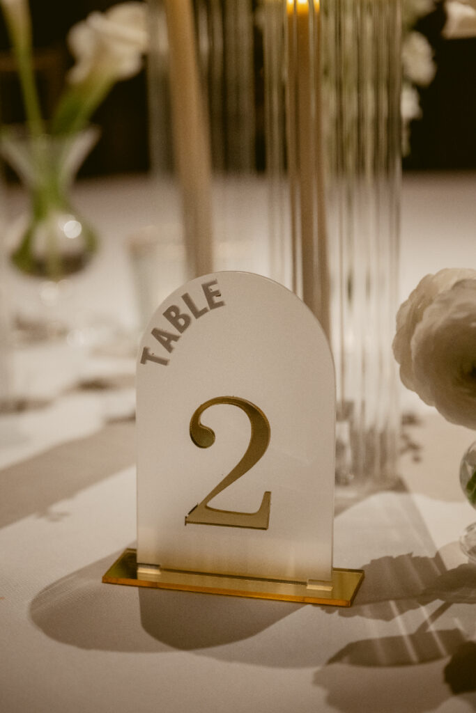Table number sign displayed as part of the reception decor.