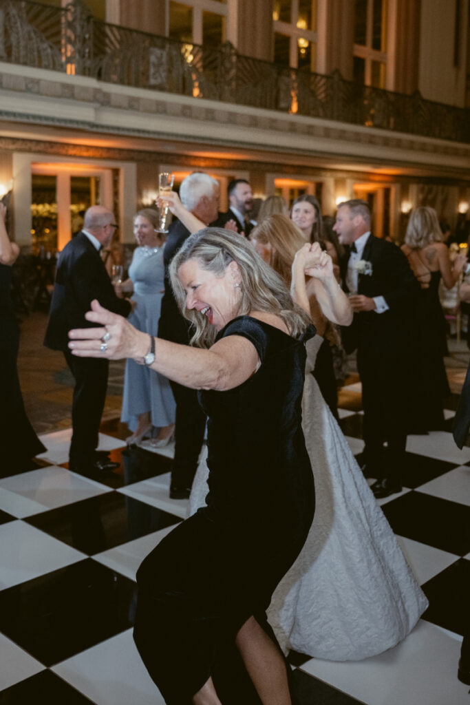 Guests sharing a dance together on the dance floor.