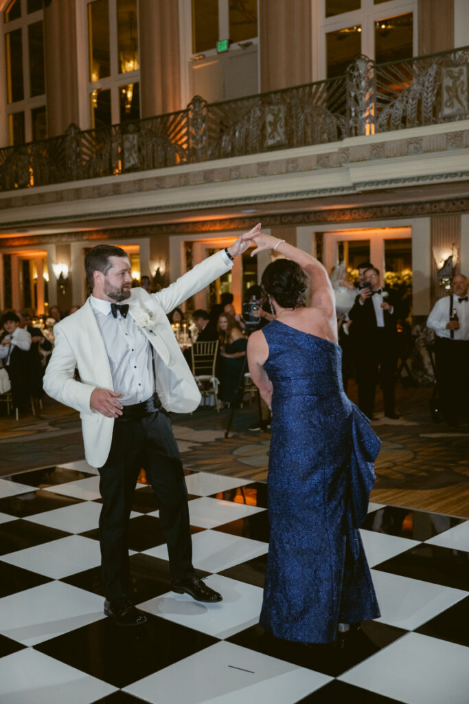 Guest dancing enthusiastically on the dance floor.