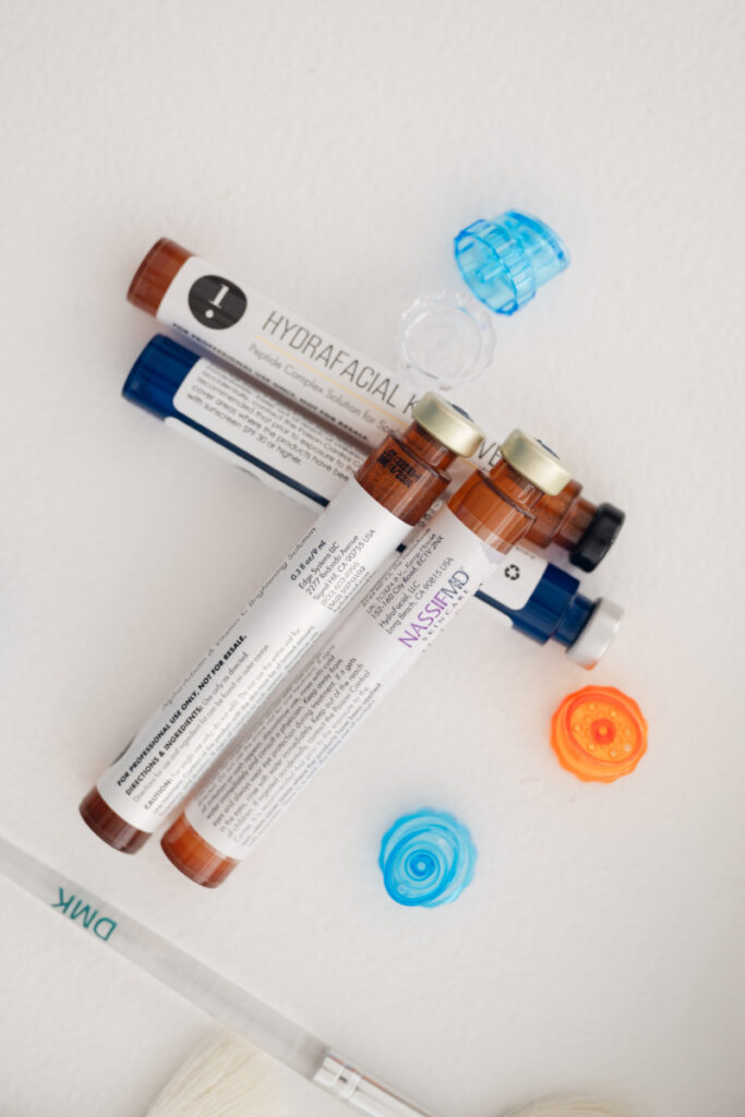 Personal branding photography of skincare products and serums styled cleanly for a modern, professional brand look