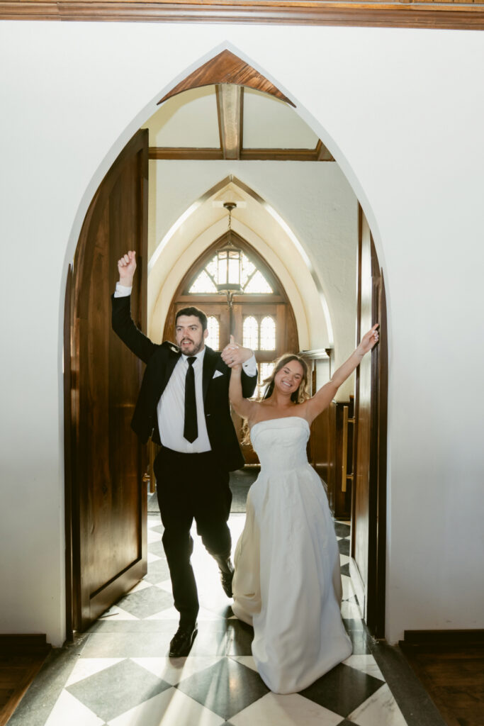 Bride and groom make an exciting reception entrance at The Palomar, one of our favorite Ohio wedding venues.