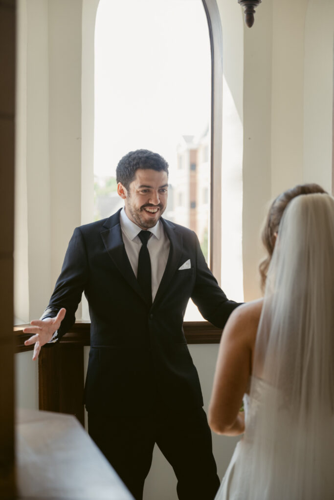 Groom smiles during a joyful first look at The Palomar, one of our favorite Ohio wedding venues.